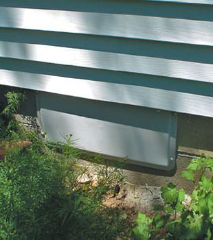 A gray crawl space vent cover in Southfield