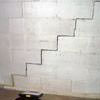 A diagonal stair step crack along the foundation wall of a West Bloomfield home