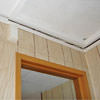 The ceiling and wall separating as the wall sinks with the slab floor in a Waterford home