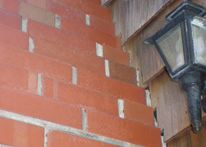 a repaired chimney in Southfield that had shown serious foundation damage and was repaired with a helical pier system.