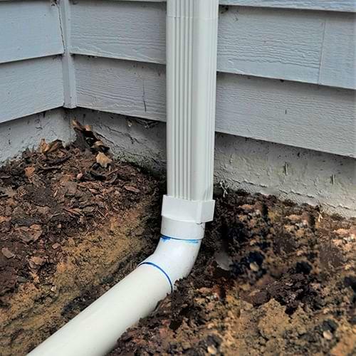 HomeSpec Waterproofing and Foundation Repair installs gutter downspout extensions in Sterling Heights, Ann Arbor, Warren