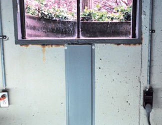 Repaired waterproofed basement window leak in Westland
